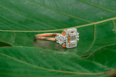 Baguette and Round Diamond Ring with Halo Frame Design