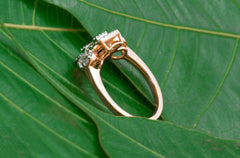 Baguette and Round Diamond Ring with Halo Frame Design