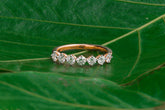 Elegant Diamond Half-Eternity Ring with Prong Setting