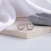 Elegant Oval-Cut Diamond Halo Stud Earrings in Rose Gold