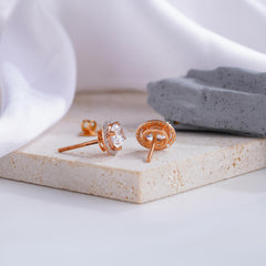 Elegant Oval-Cut Diamond Halo Stud Earrings in Rose Gold