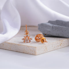 Elegant Oval-Cut Diamond Halo Stud Earrings in Rose Gold