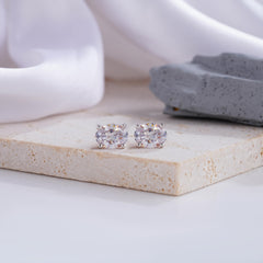 Brilliant Oval-Cut Diamond Stud Earrings in White Gold