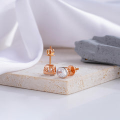 Oval-Cut Diamond Stud Earrings in Rose Gold