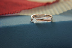 Delicate Two-Ring Bridal Set with Solitaire Diamond