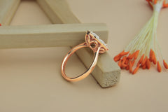 Elegant Oval-Shaped Diamond Cluster Ring in Rose Gold