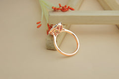 Elegant Oval-Shaped Diamond Cluster Ring in Rose Gold